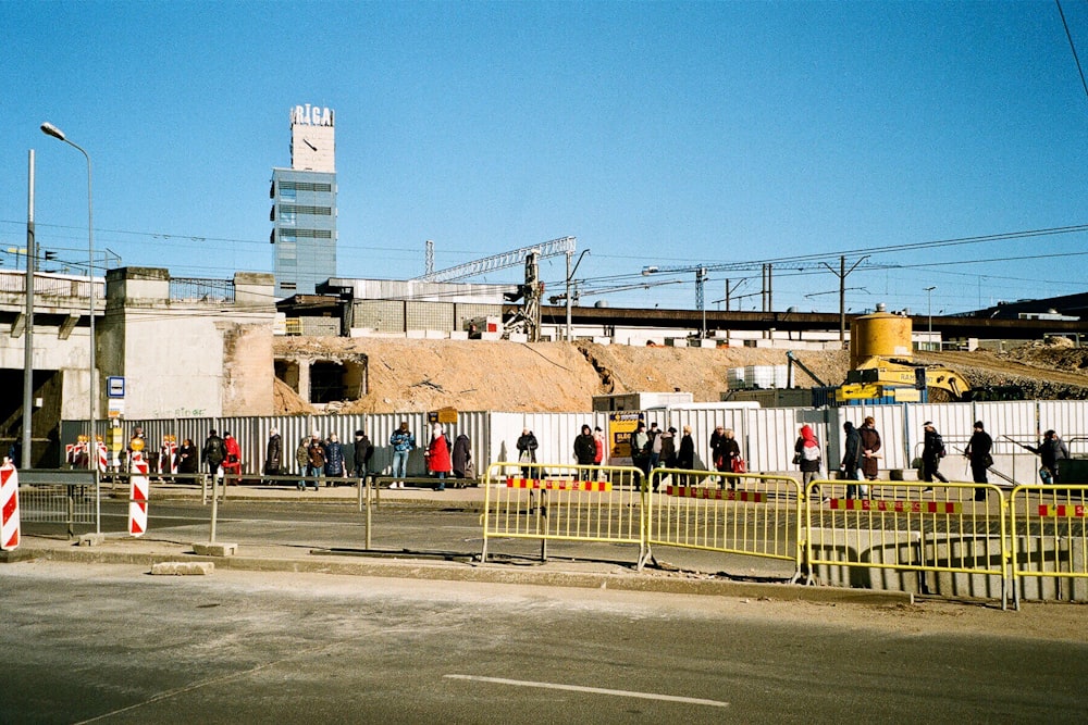 a group of people standing outside of a building