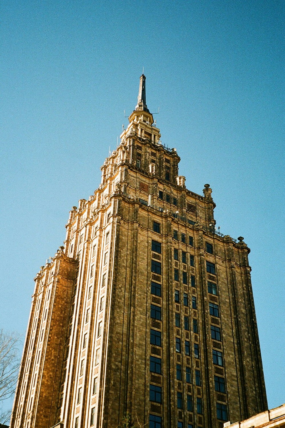 a tall building with a clock on the top of it