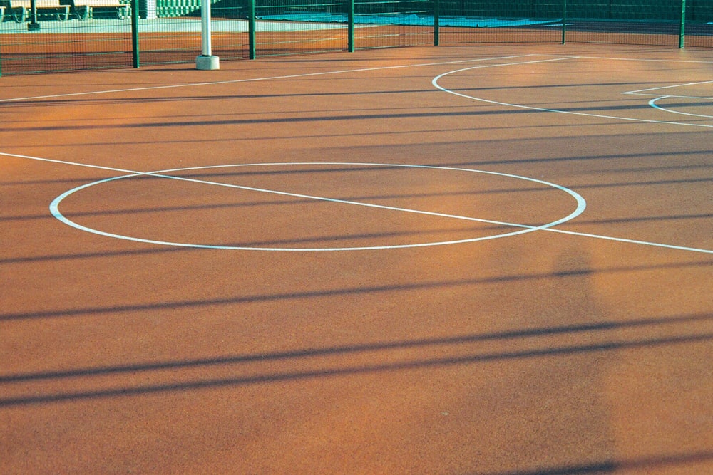 a tennis court with a line of white lines on it
