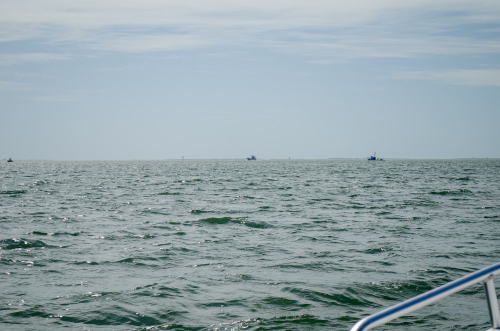 a body of water with boats in the distance