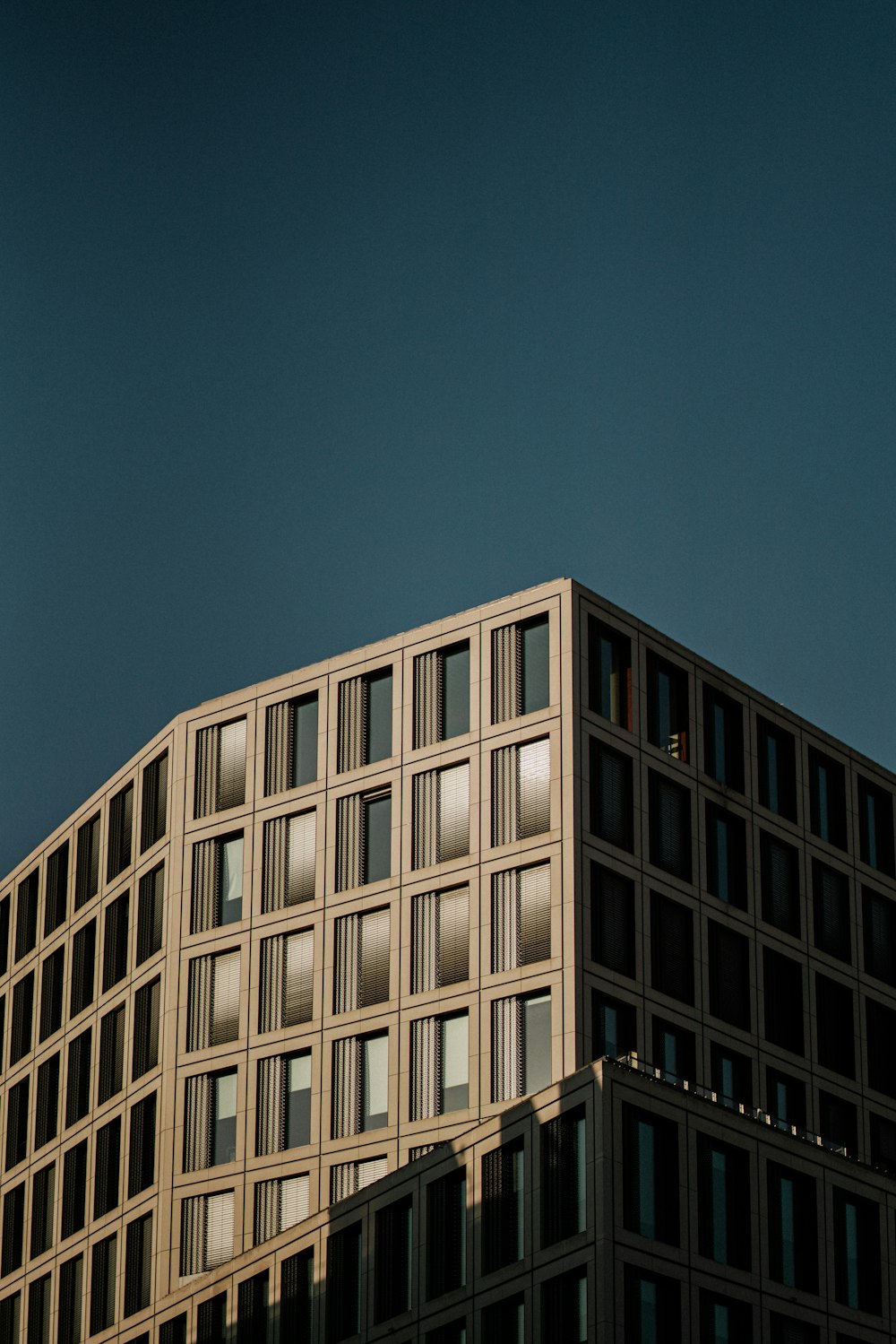 a tall building with lots of windows on top of it