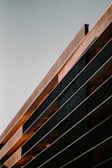 Sunset view of a completed building project with clean lines and modern architecture