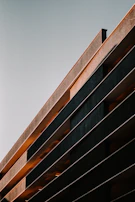 A panoramic view of a completed commercial building with clean architectural lines.