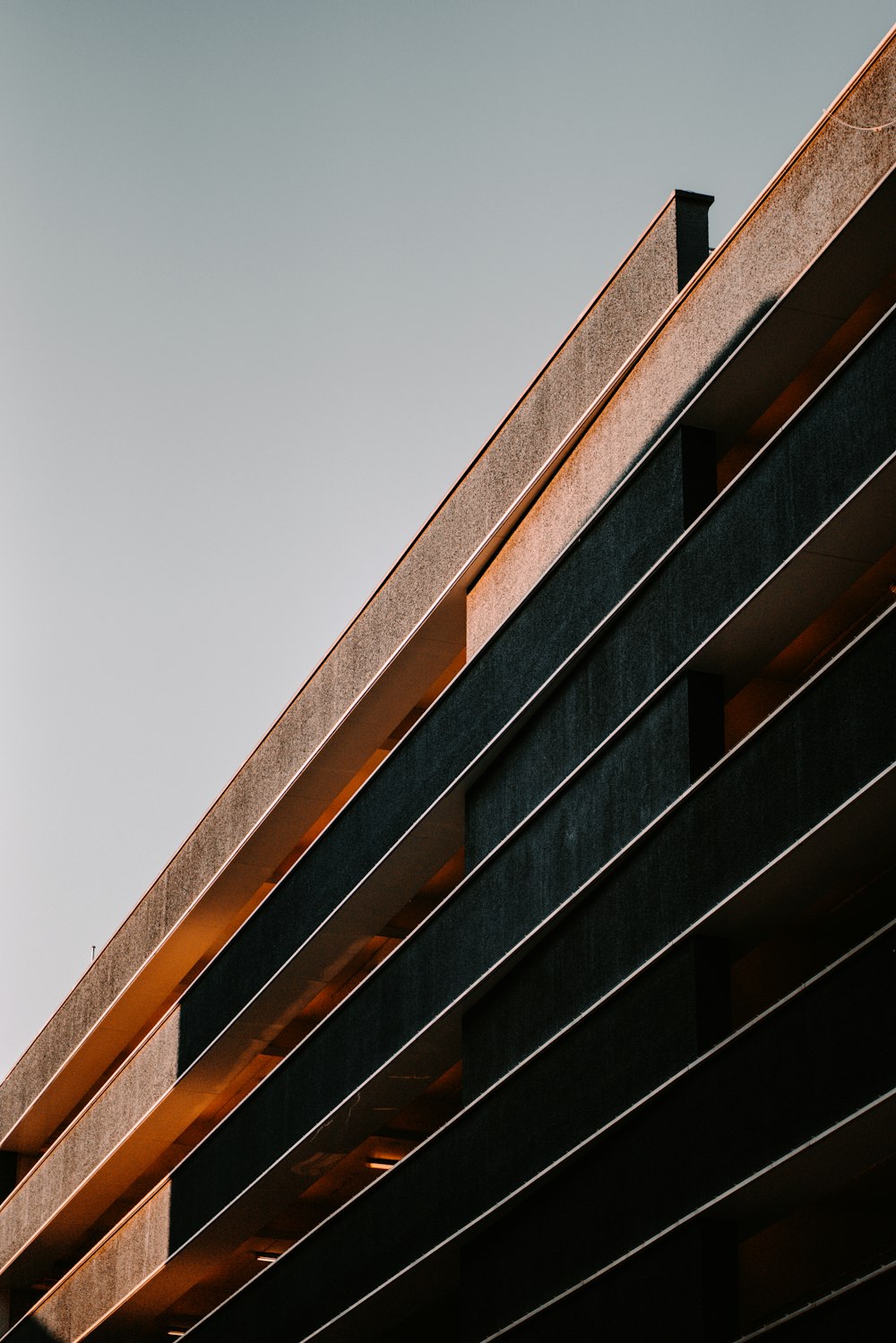 a tall building with a clock on the side of it