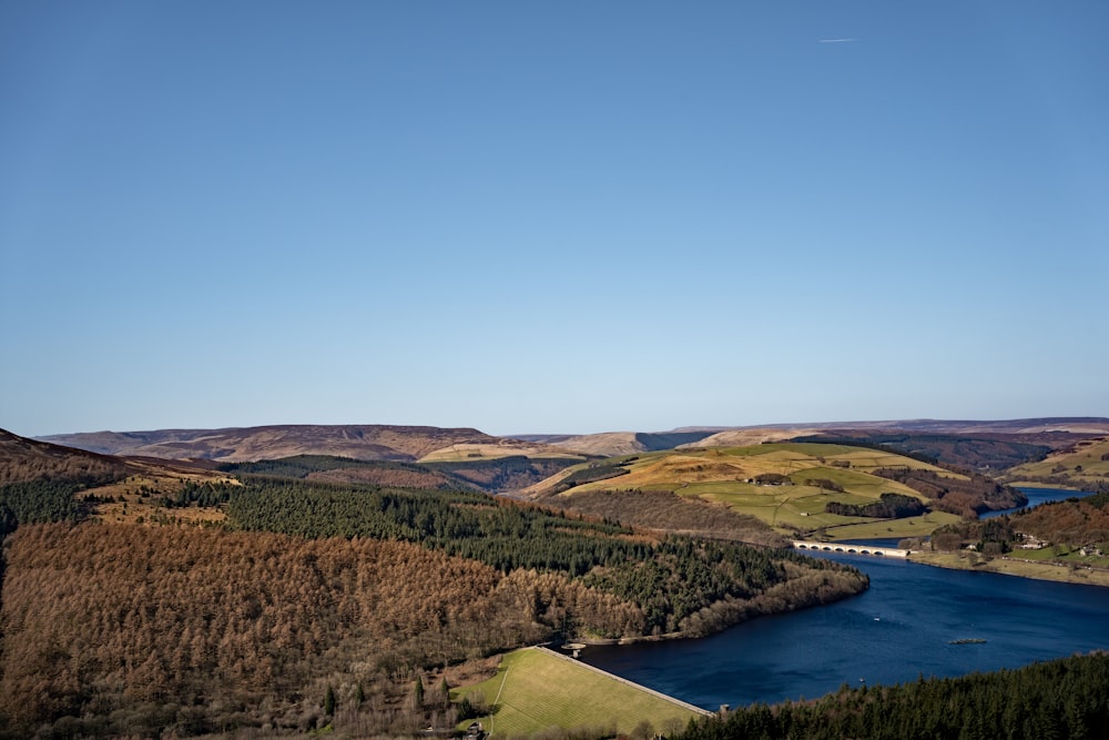 a lake in the middle of a hilly area