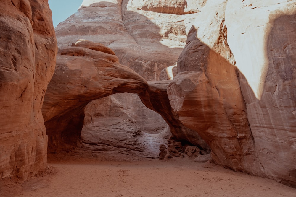 a large rock formation in the middle of a desert