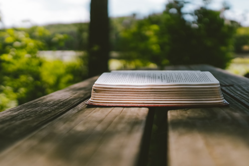 a book sitting on top of a wooden table