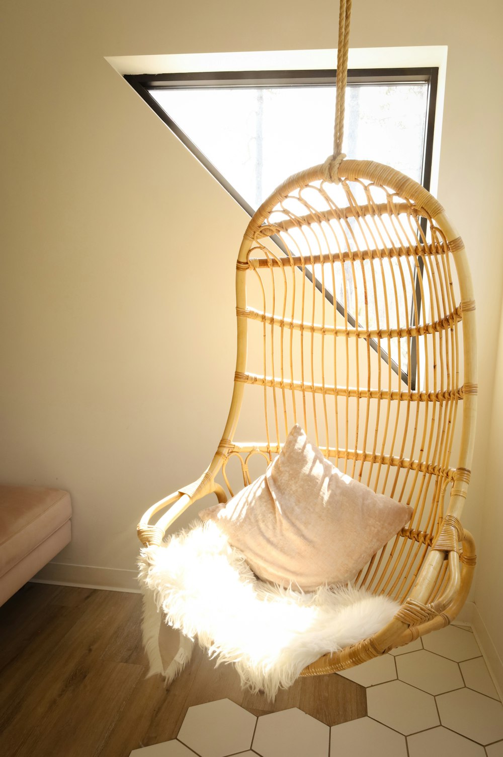 a hammock hanging from a ceiling in a room