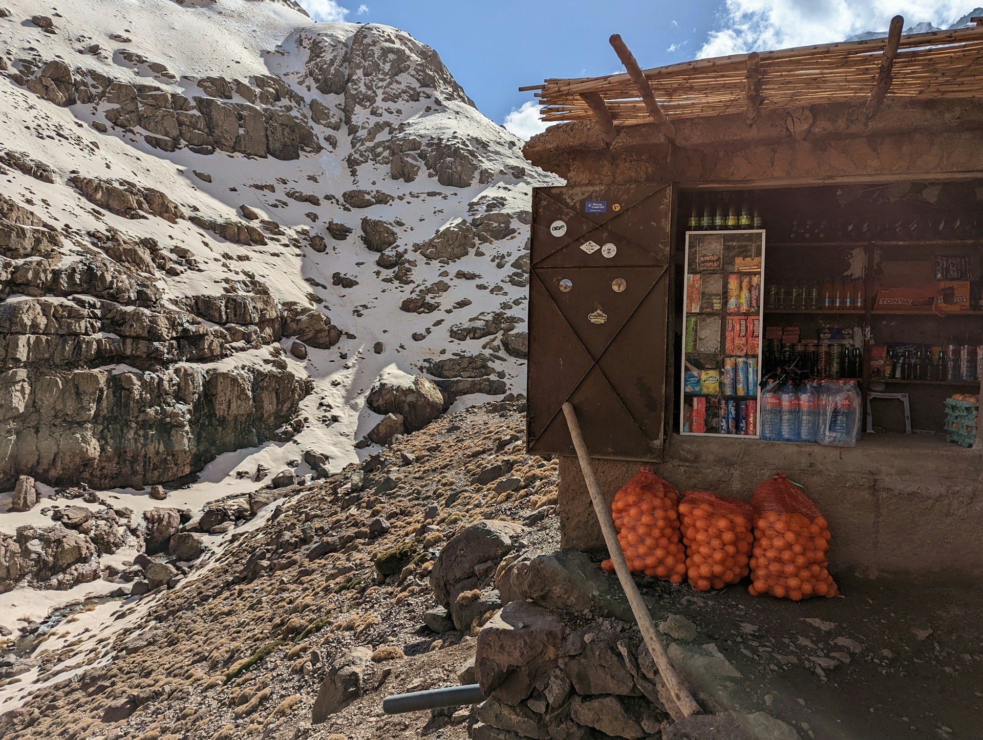 a store on the side of a snowy mountain