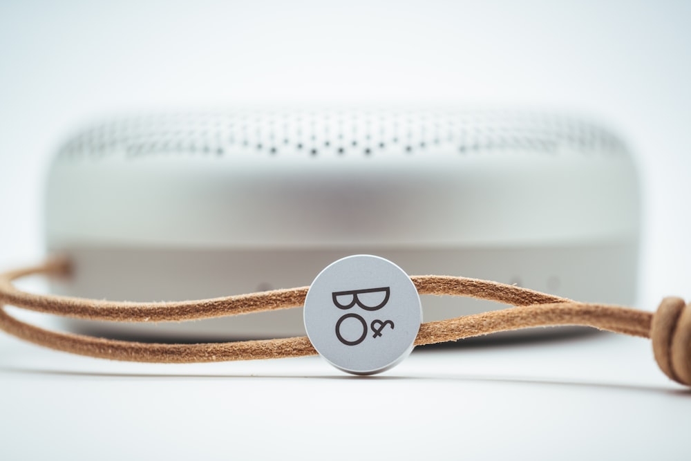 a close up of a speaker on a cord