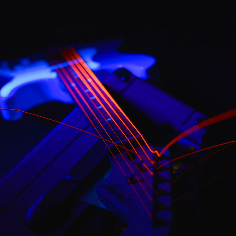 a close up of a violin in the dark