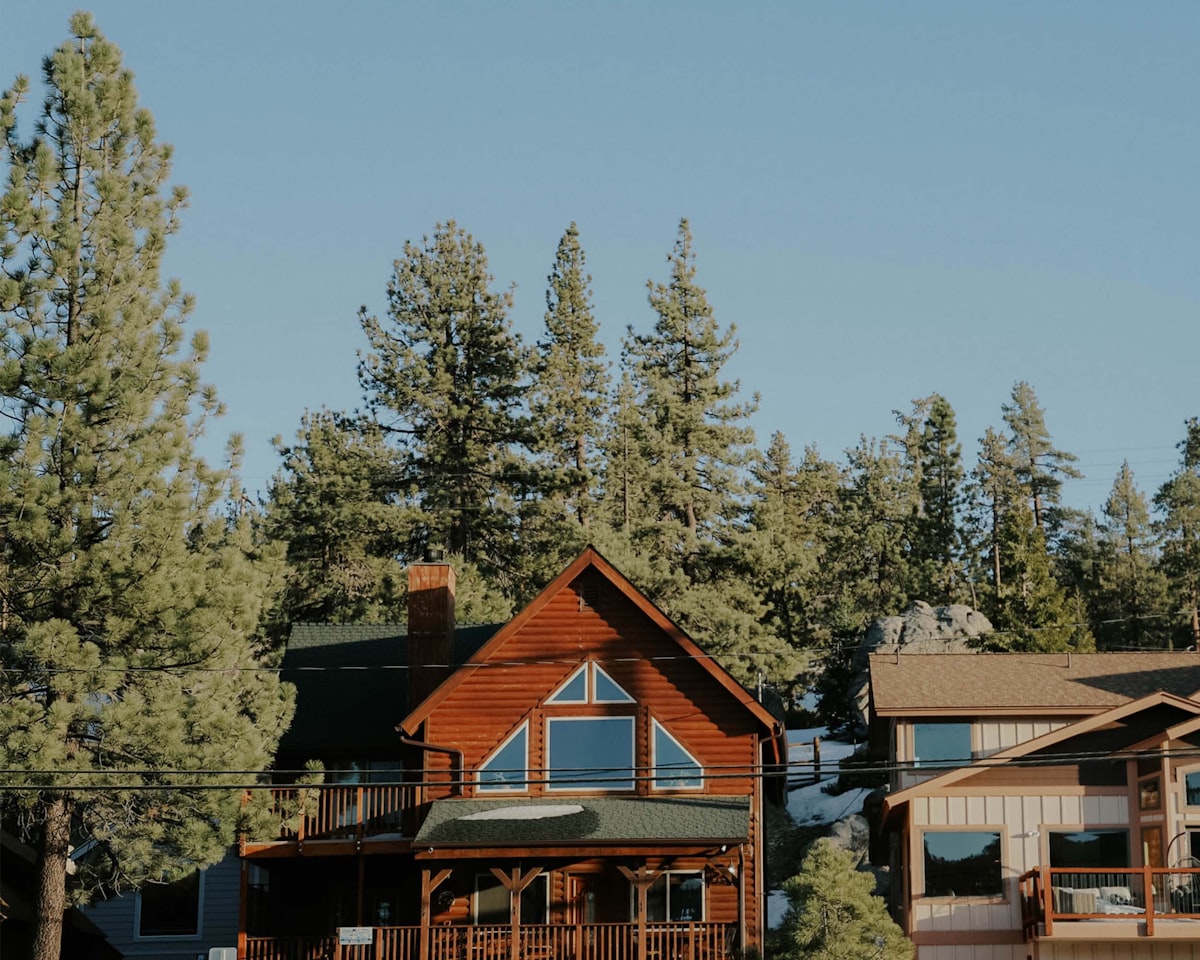 House nestled among pine trees in the Sierra Foothills of Nevada County CA