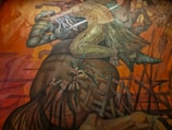 a painting of a man riding a horse