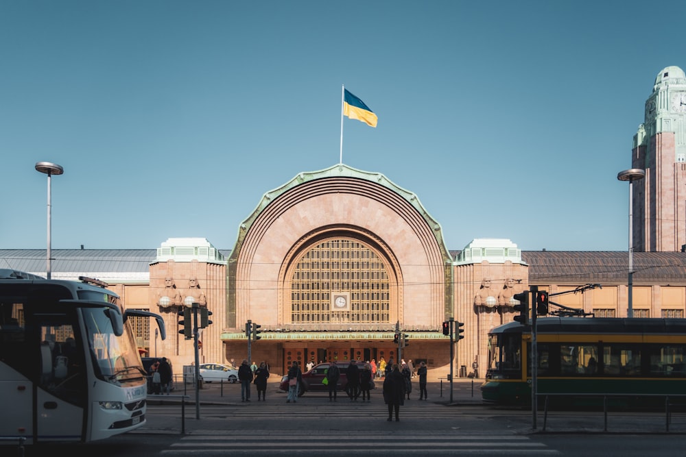 a large building with a flag on top of it