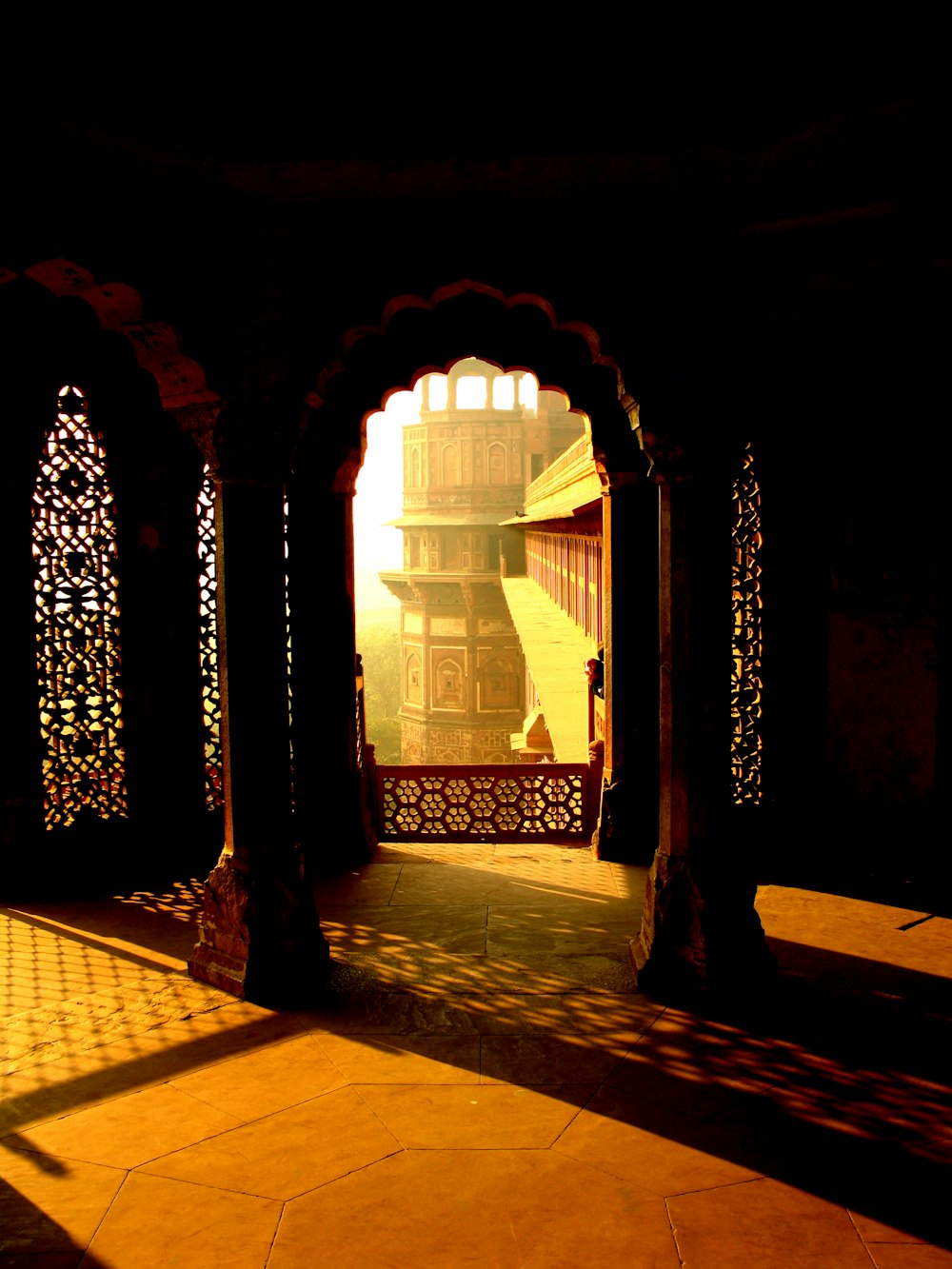 a view of a building through an archway