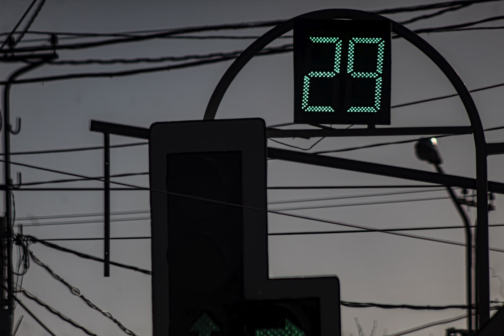 a traffic light with a sign that reads 25