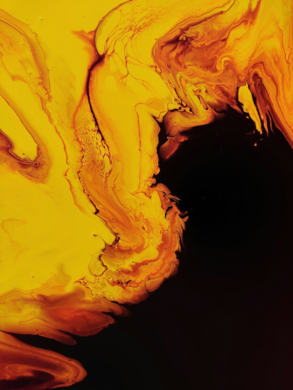 a close up of a yellow and red liquid