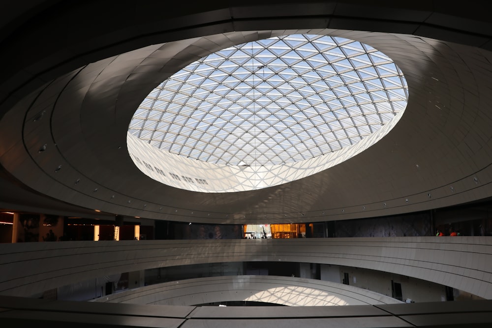 a large circular building with a skylight above it