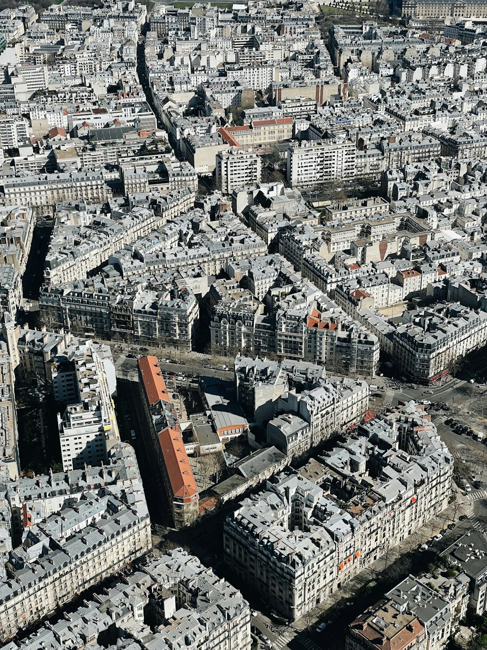 an aerial view of a city with lots of tall buildings