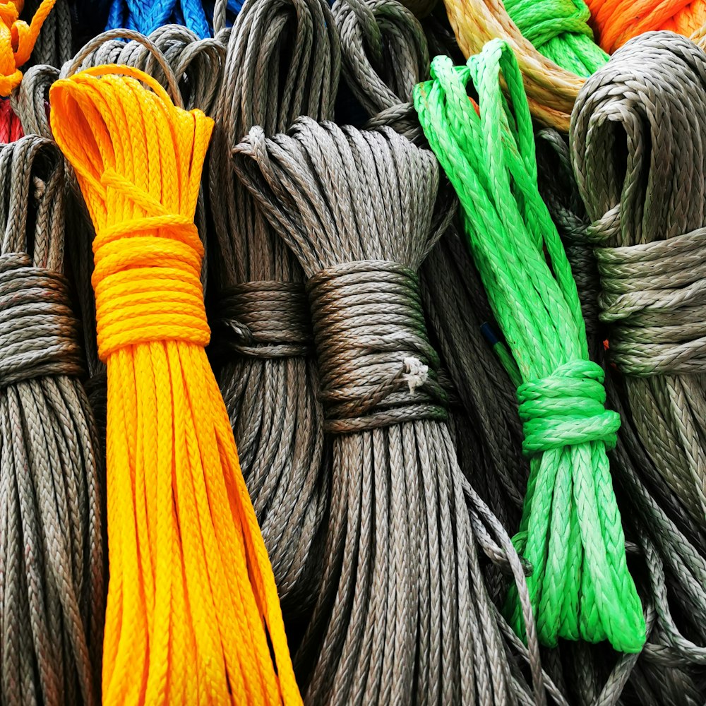 a bunch of different colored rope on display