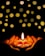Close-up of a handmade candle glowing softly inside a vintage teacup on a wooden table.