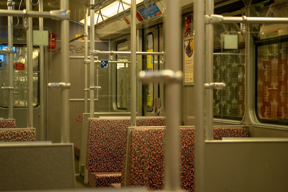 a view of a subway car from inside the car