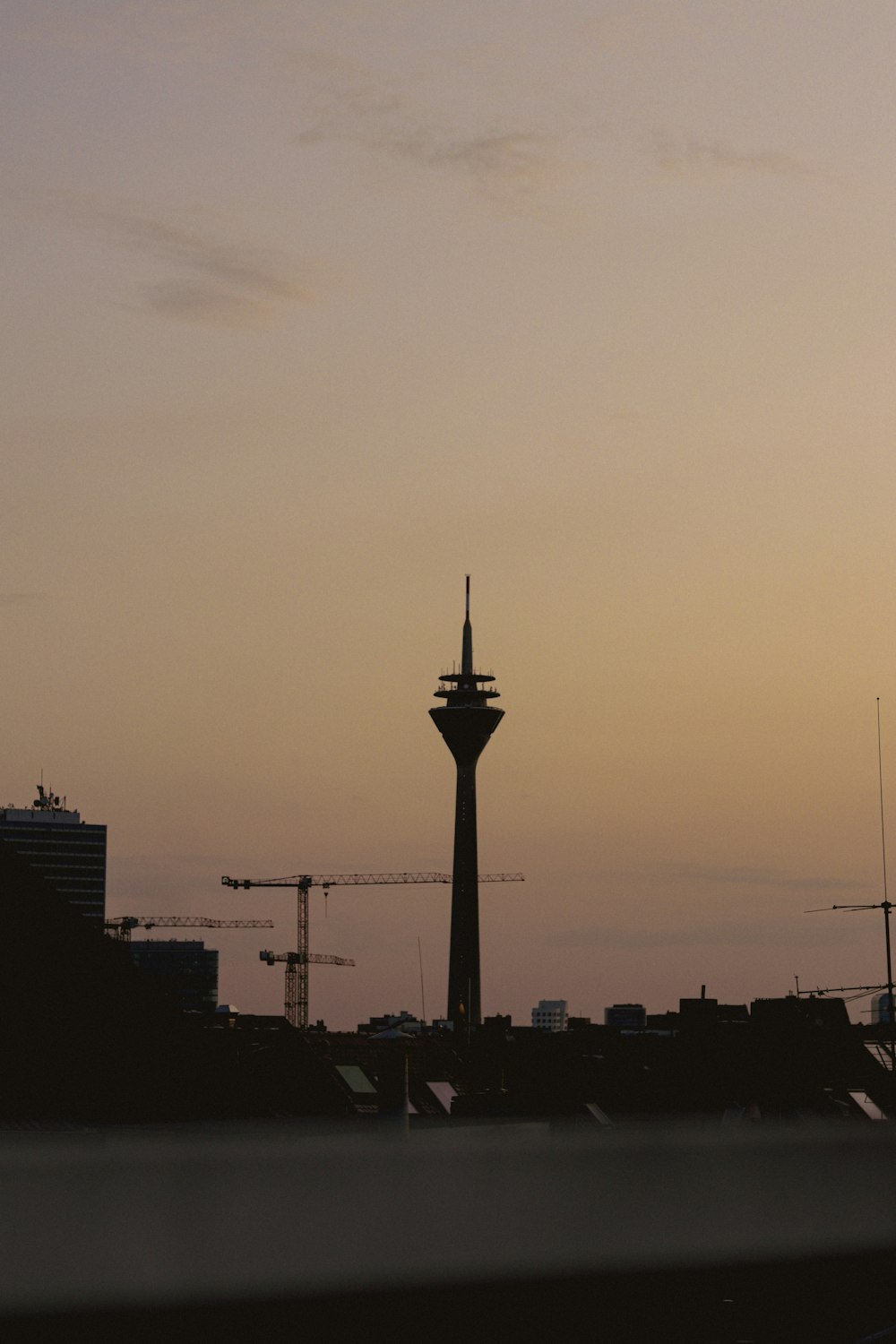 a tall tower with a clock on top of it