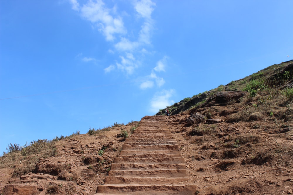 a set of stairs going up a hill