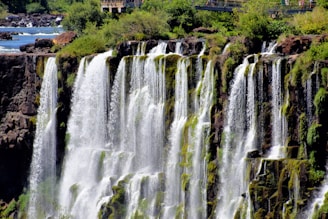 a large waterfall with lots of water coming out of it