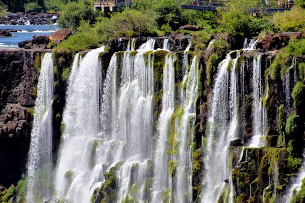 a large waterfall with lots of water coming out of it