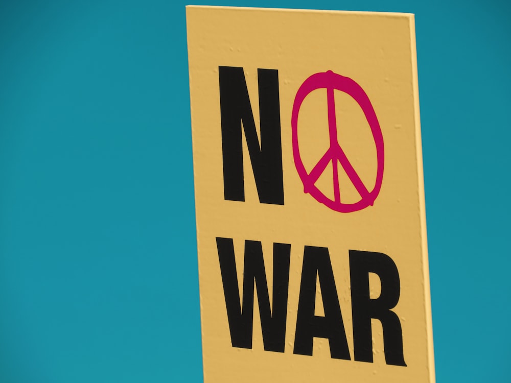 a no war sign with a peace sign on it