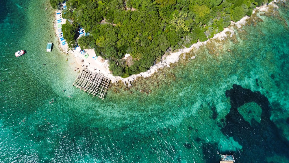 an aerial view of a small island in the middle of the ocean