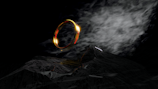 A glowing golden ring hovers against a dark background with swirling mist. Below it, a rugged, shadowy terrain resembling a mountainous landscape adds depth and mystery.