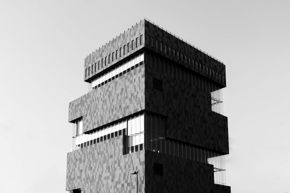 a black and white photo of a tall building