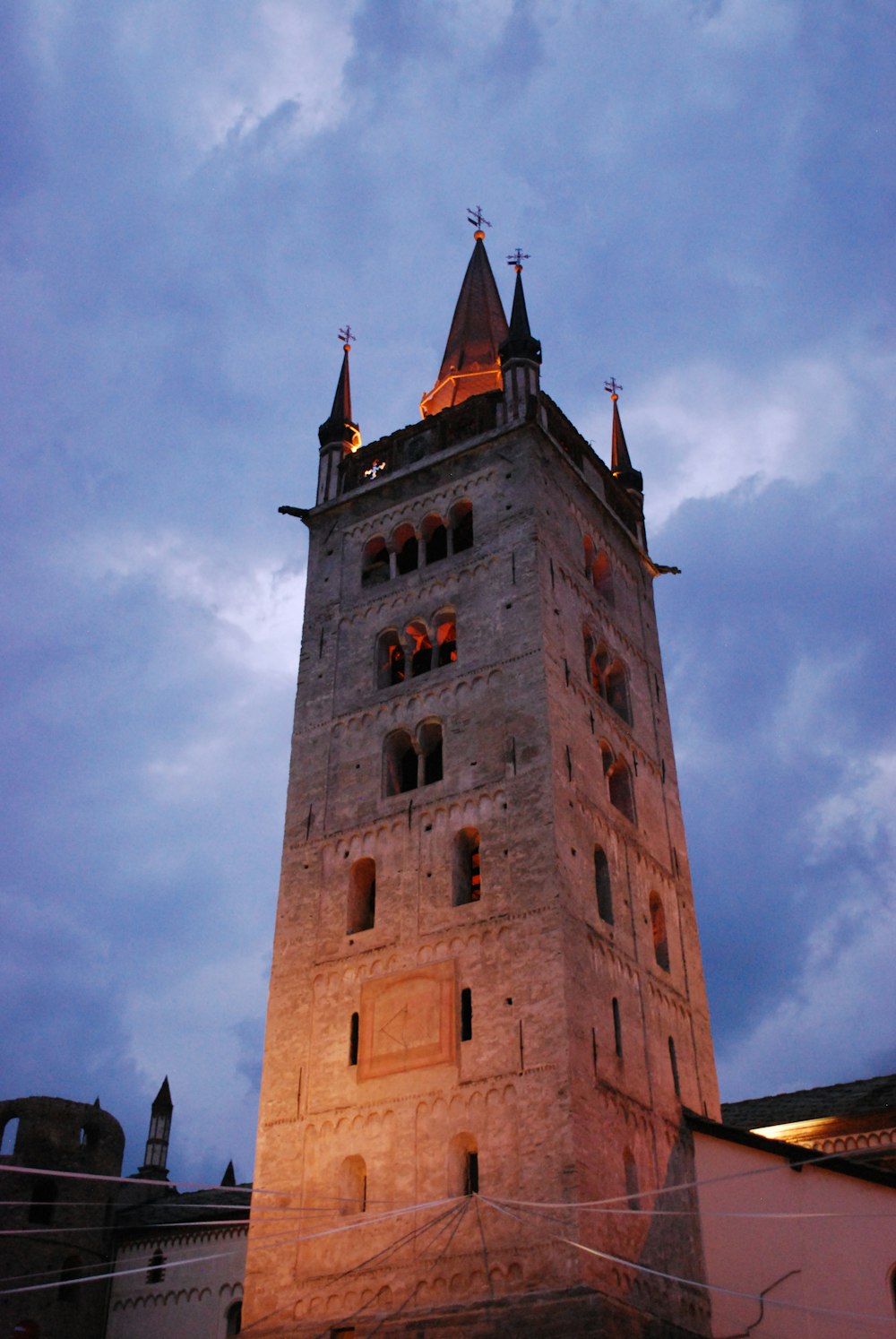 a tall tower with a clock on the top of it