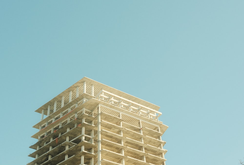 a tall building with a sky background