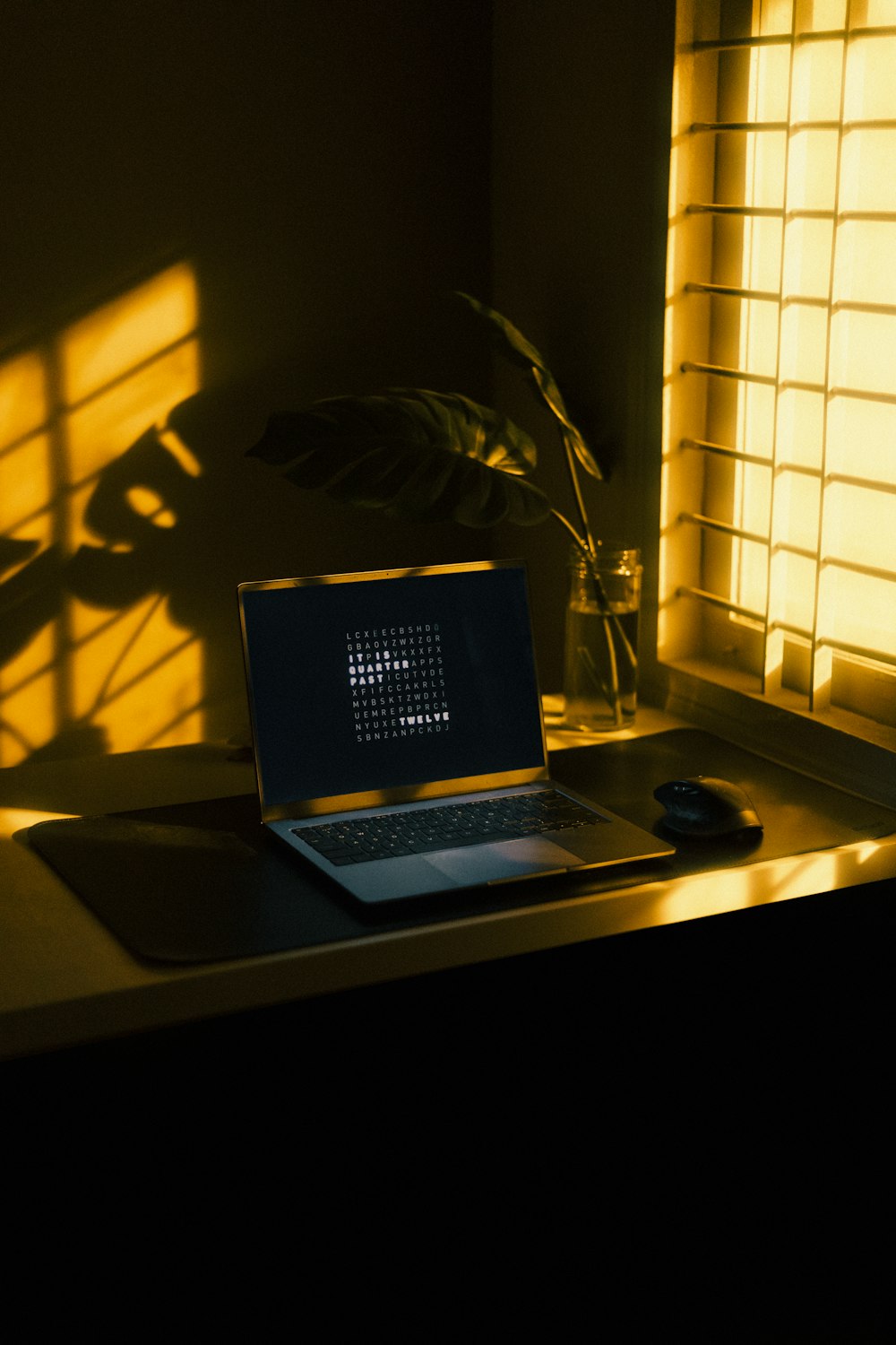 a laptop computer sitting on top of a desk