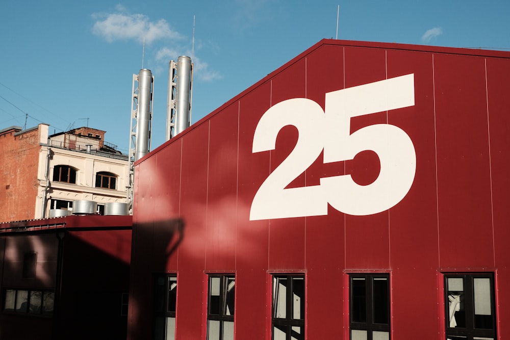 a red building with the number twenty five on it