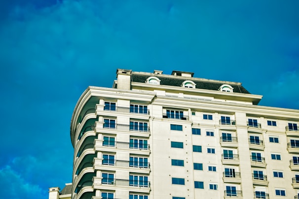 A 2D architectural blueprint of a multi-story residential building with clear annotations.