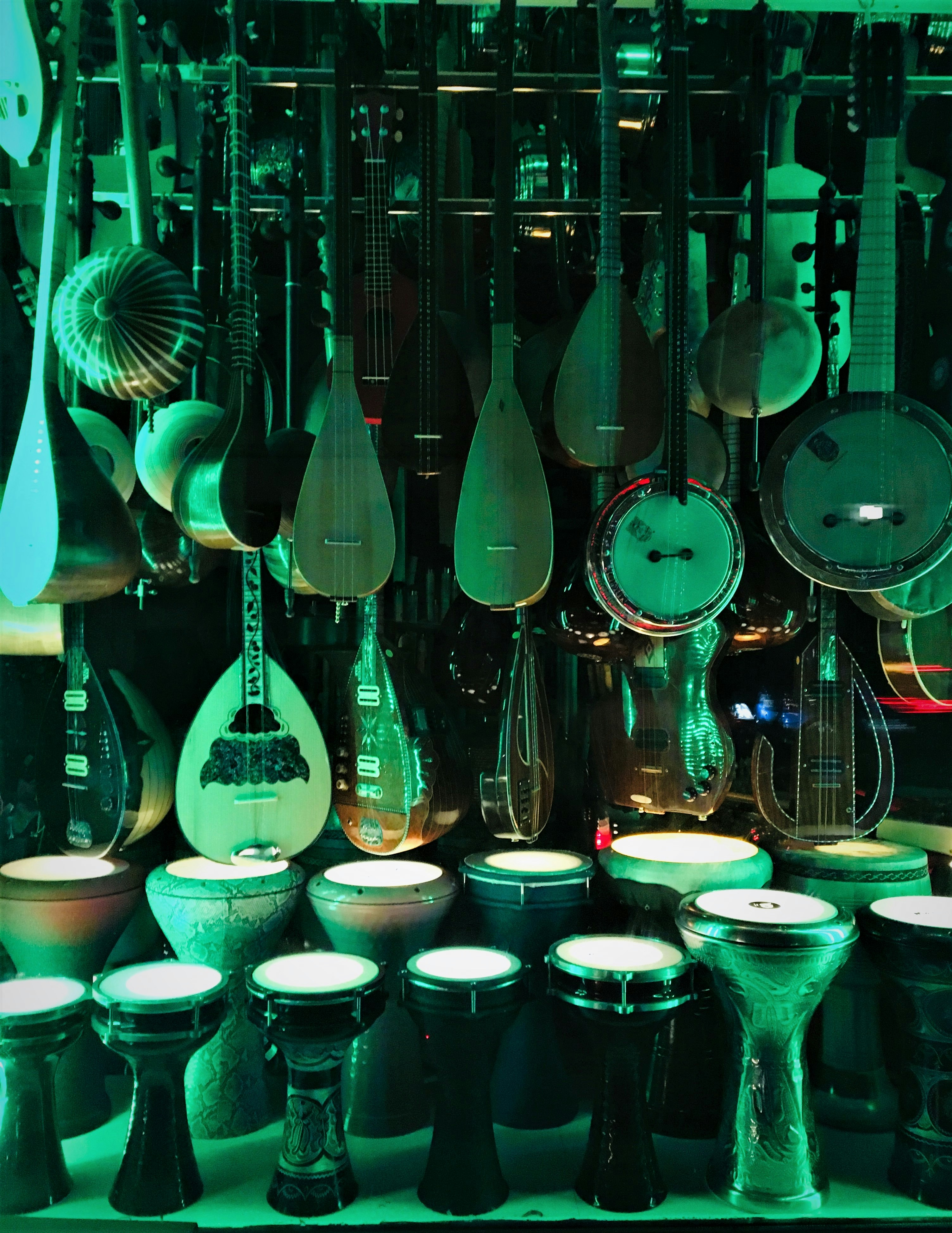 A room filled with lots of different types of musical instruments photo ...