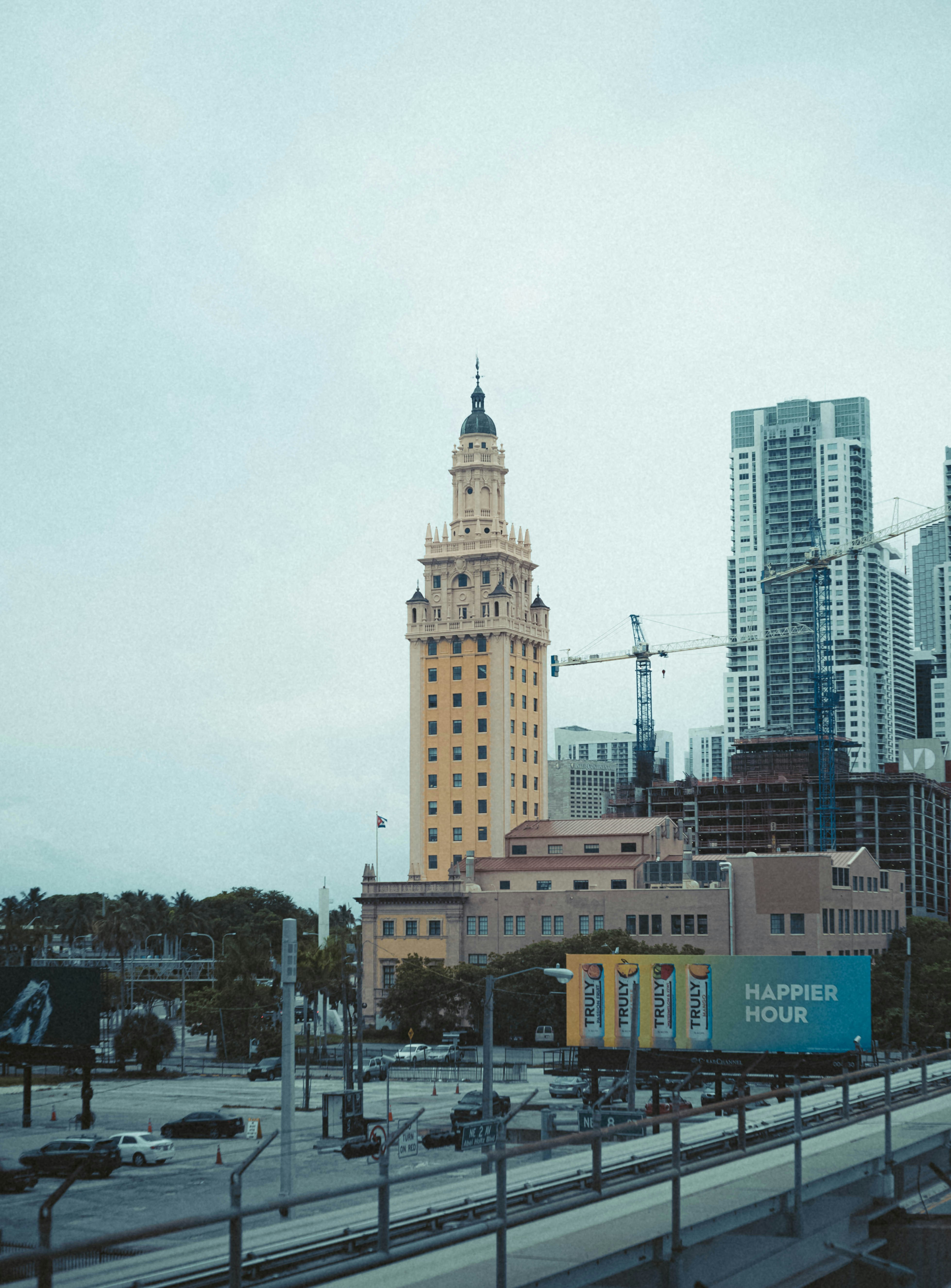 a view of a city with tall buildings in the background