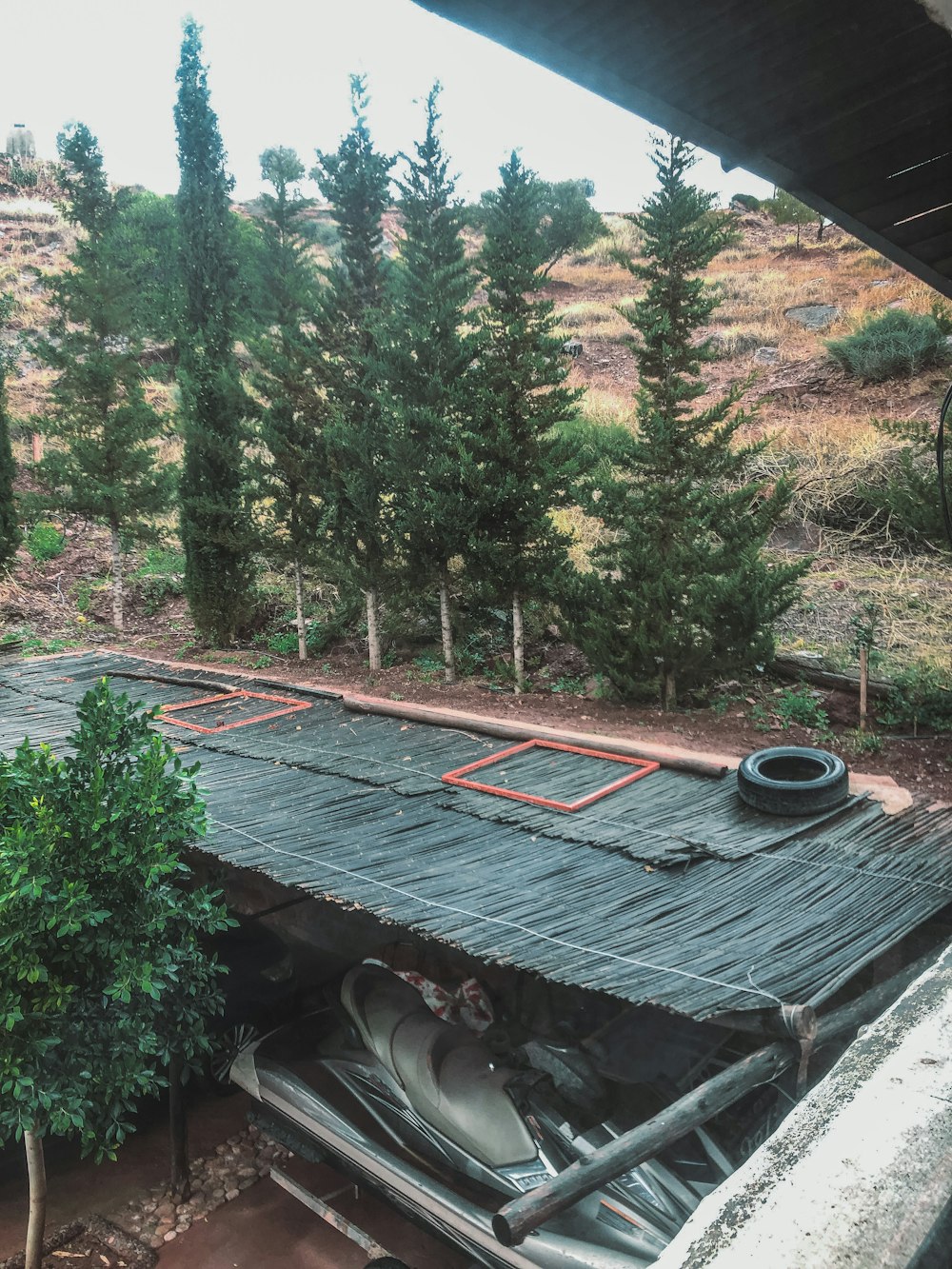 a roof that has a tire on top of it