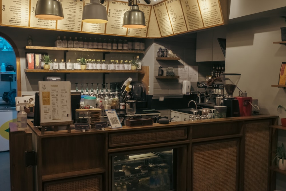 a coffee shop with a lot of lights hanging from the ceiling