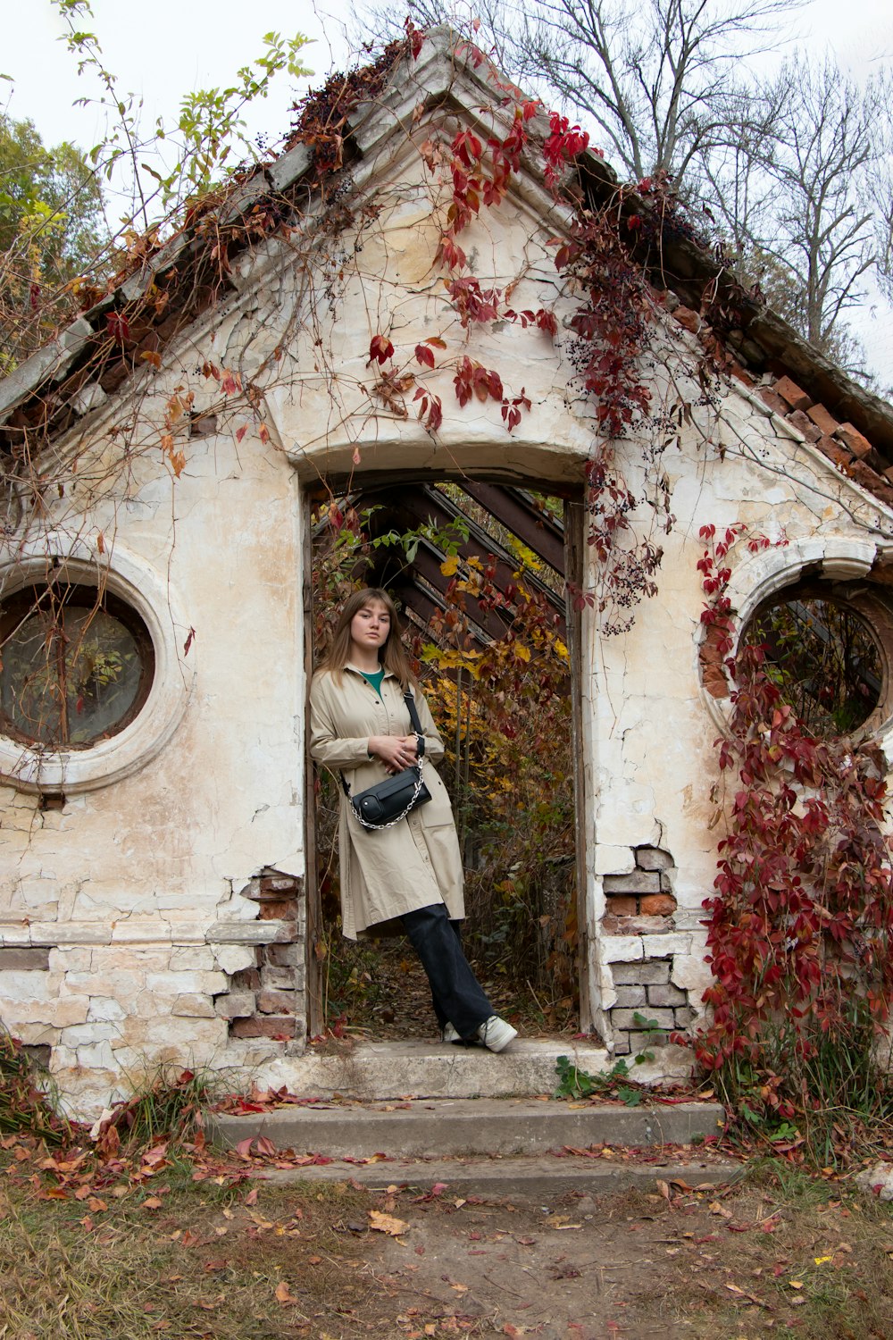 a woman standing in a doorway of a building