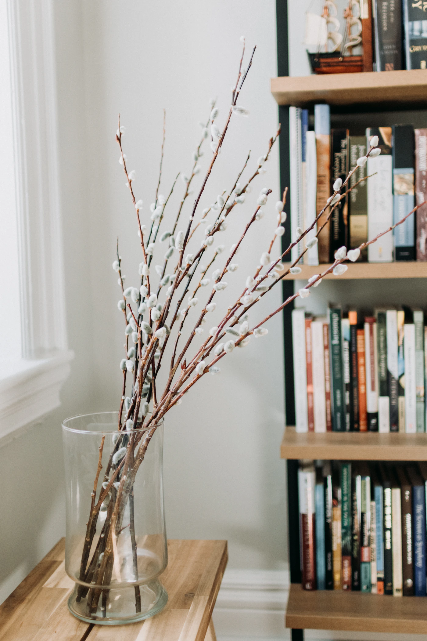 Sculptural vase with natural branches in a refined interior