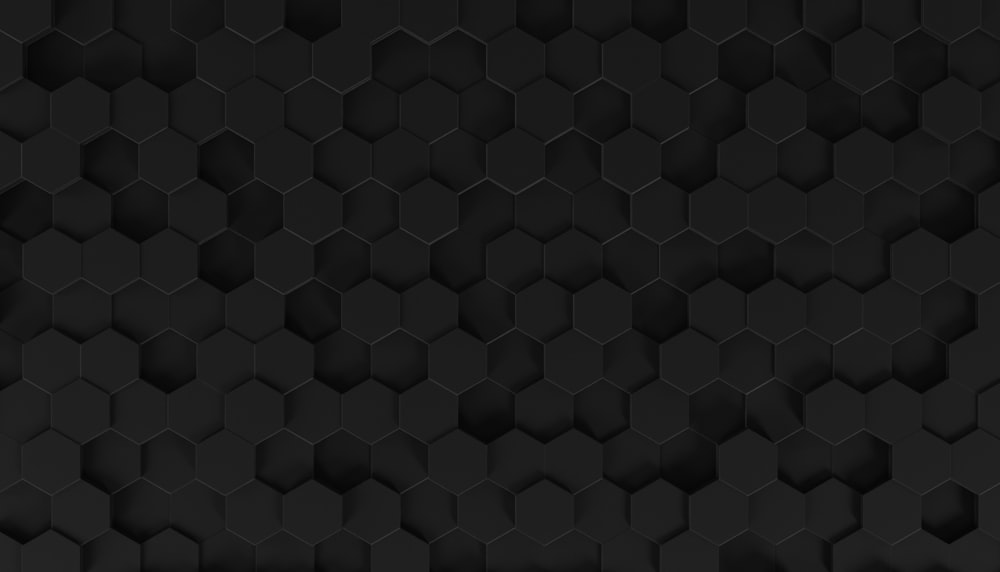 a black background with hexagonal shapes