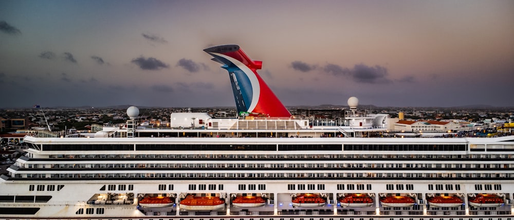 a large cruise ship docked in a harbor