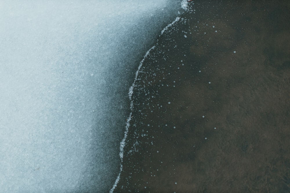 a close up of snow on the ground