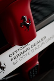 a close up of a ferrari logo on a car