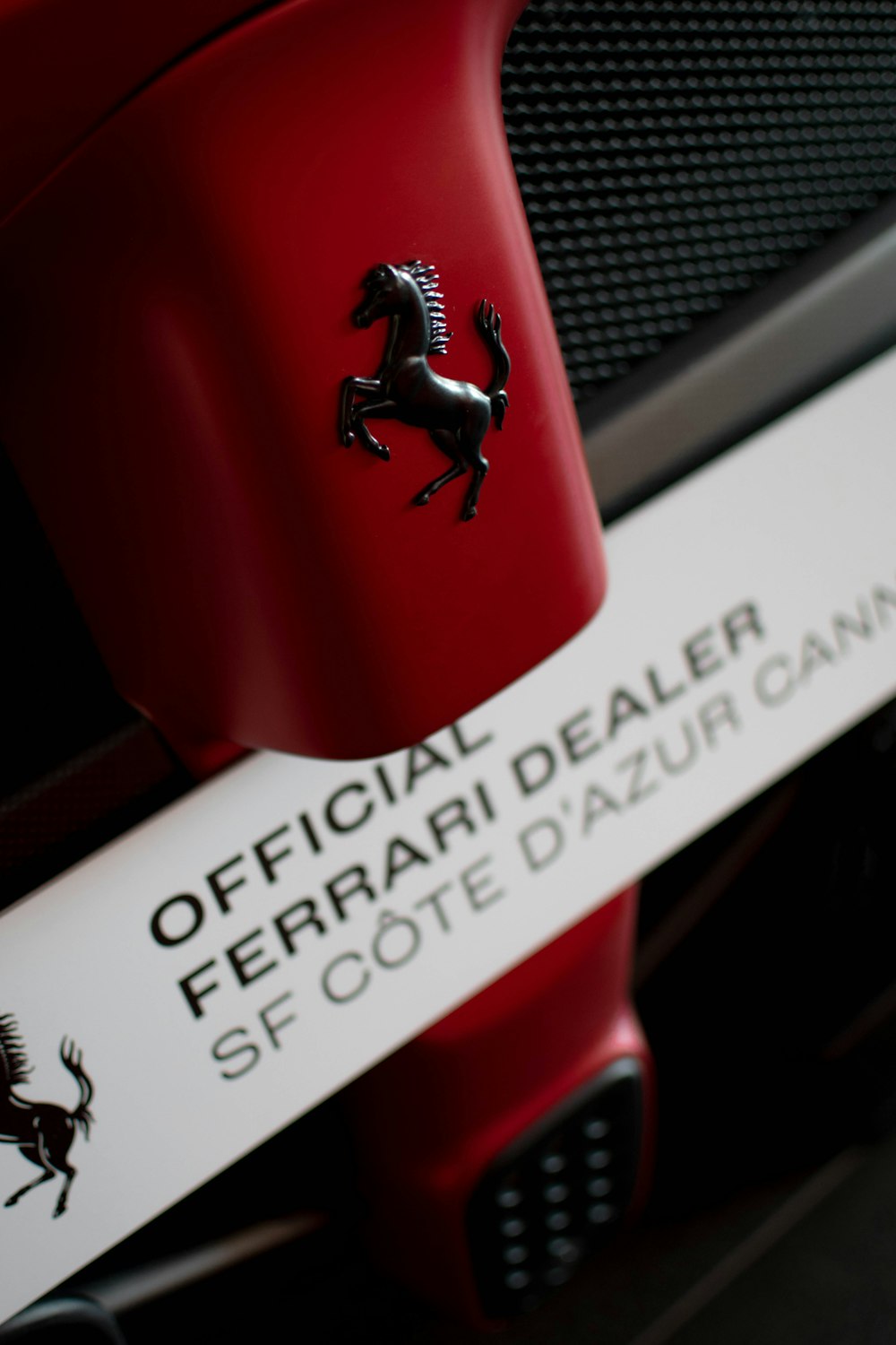 a close up of a ferrari logo on a car